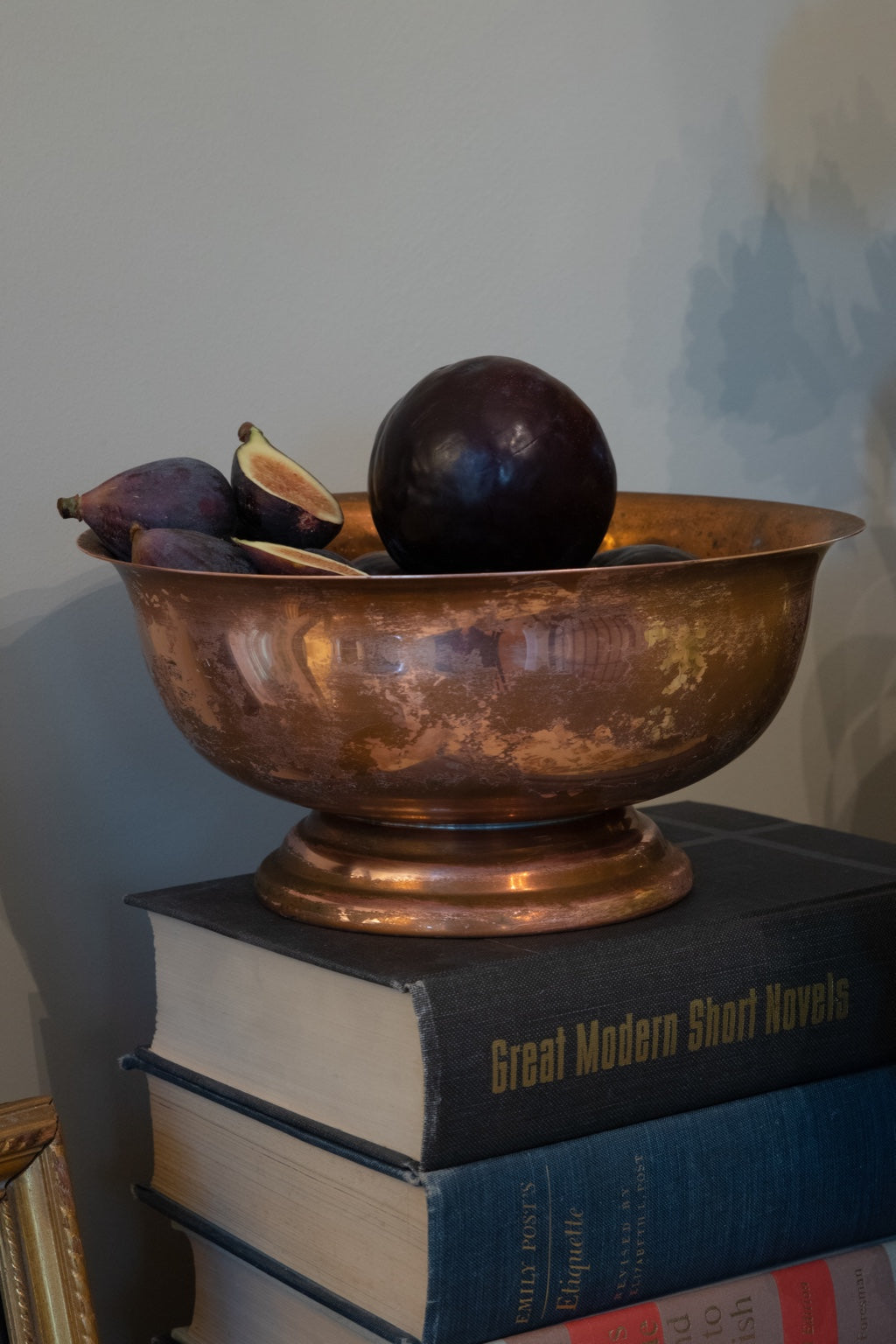 Vintage Coppercraft Guild footed copper bowl styled with figs and dark fruit